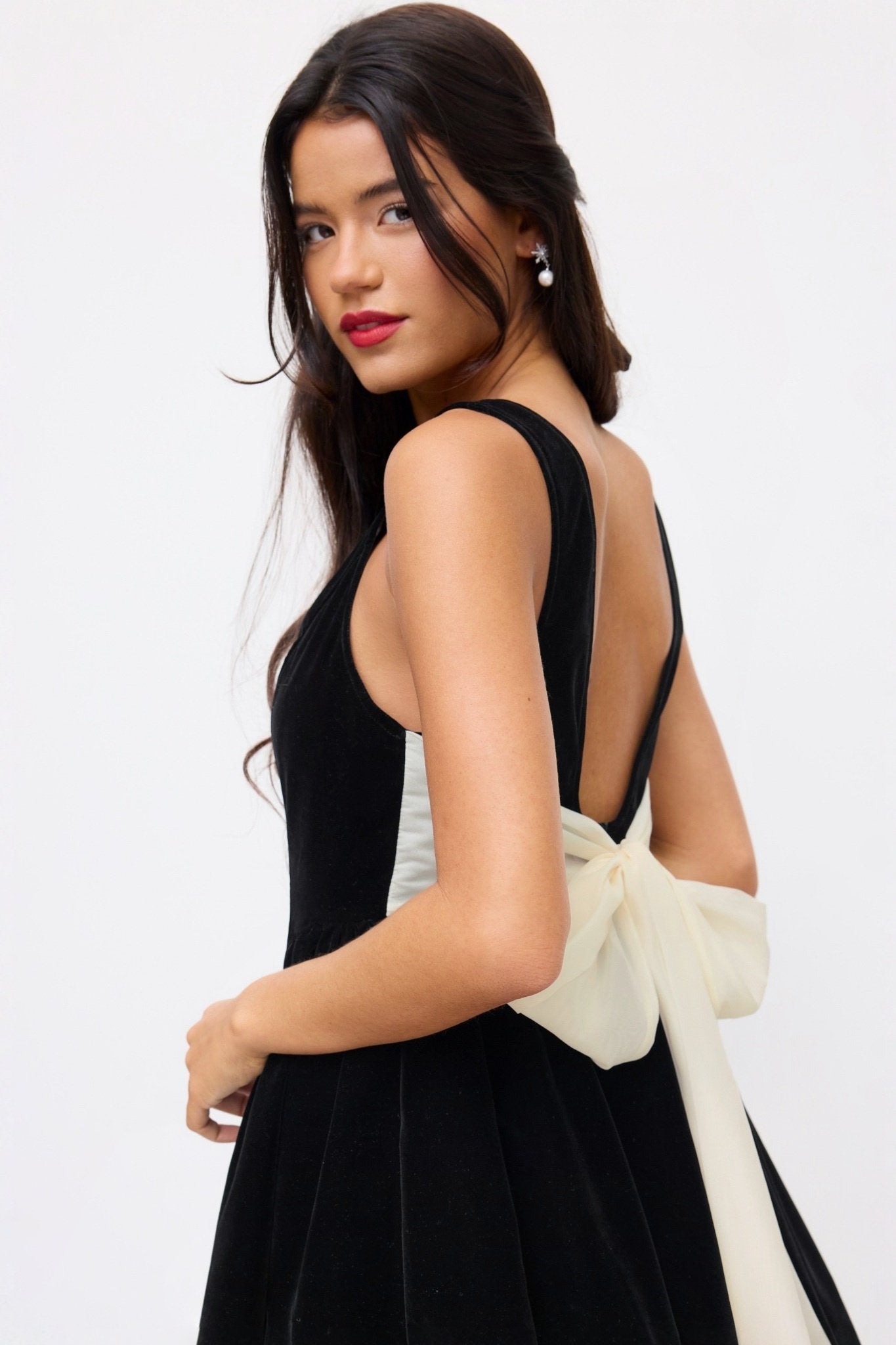 Ezabutus Black Velvet Boat Neck Mini Dress With Contrast Bow And Ruffle Hem