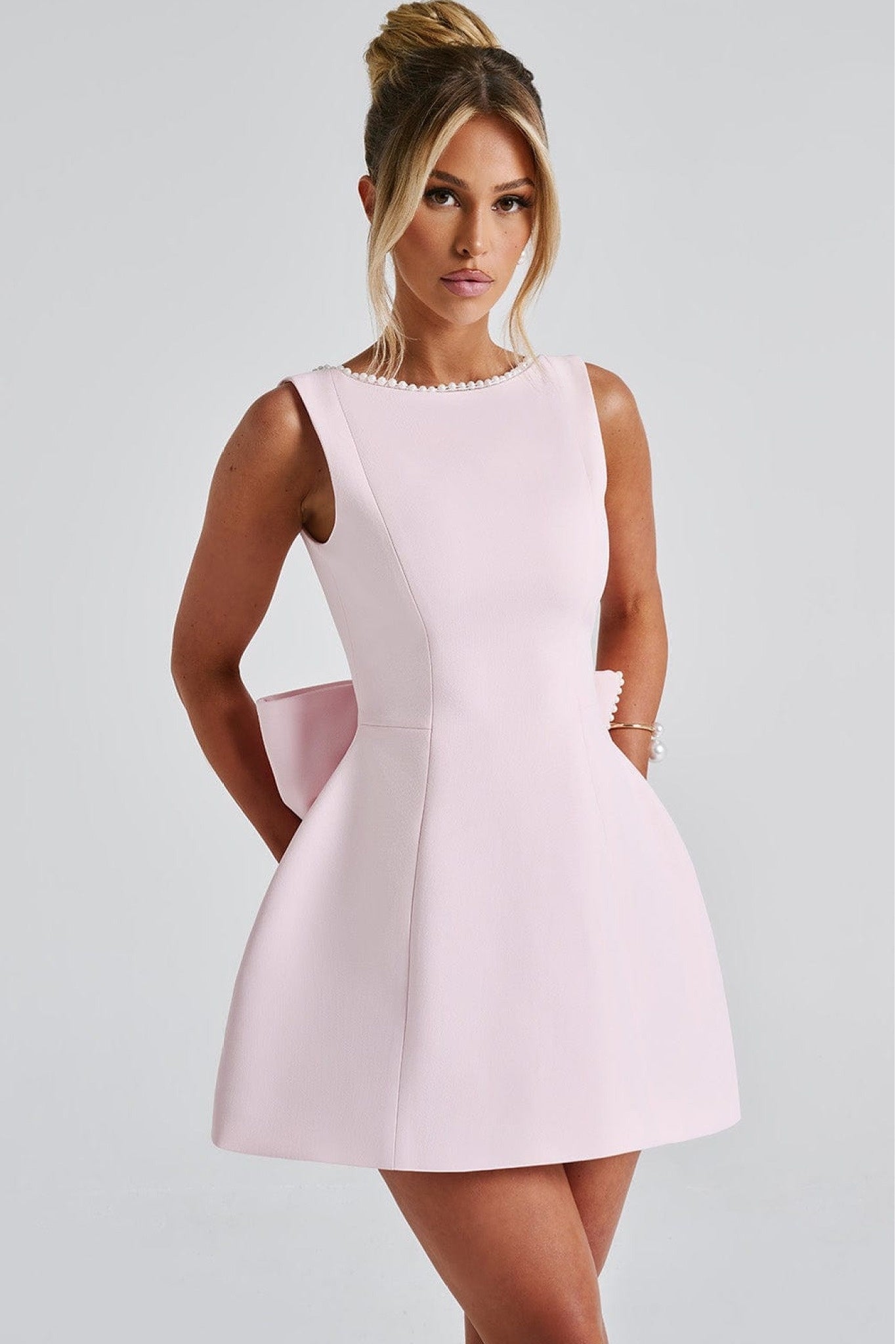 Ezabutus Elegant Pearl Trim Bow Back Mini Dress – Available in Pink, Black & White