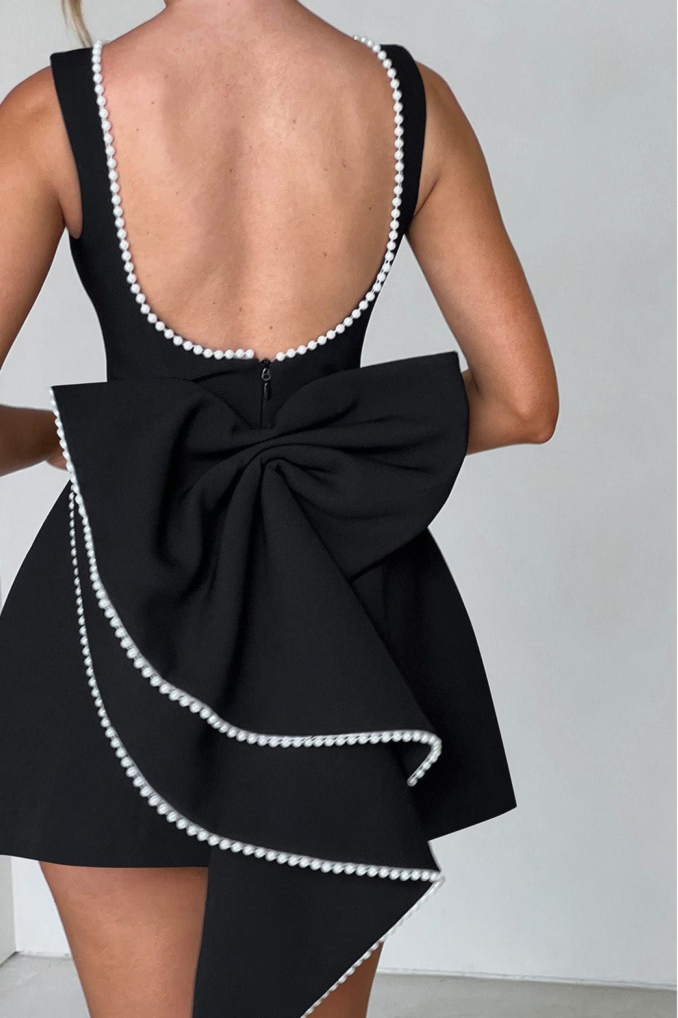 Ezabutus Elegant Pearl Trim Bow Back Mini Dress – Available in Pink, Black & White