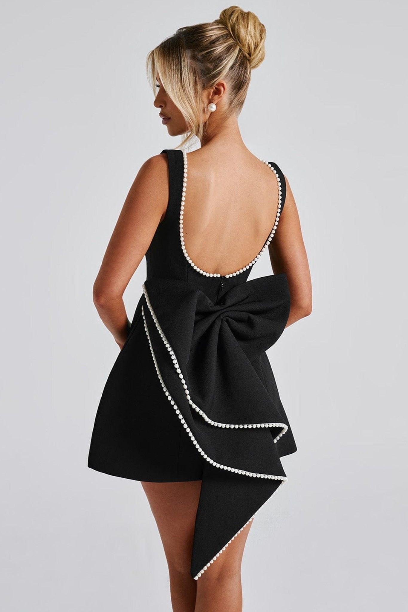 Ezabutus Elegant Pearl Trim Bow Back Mini Dress – Available in Pink, Black & White