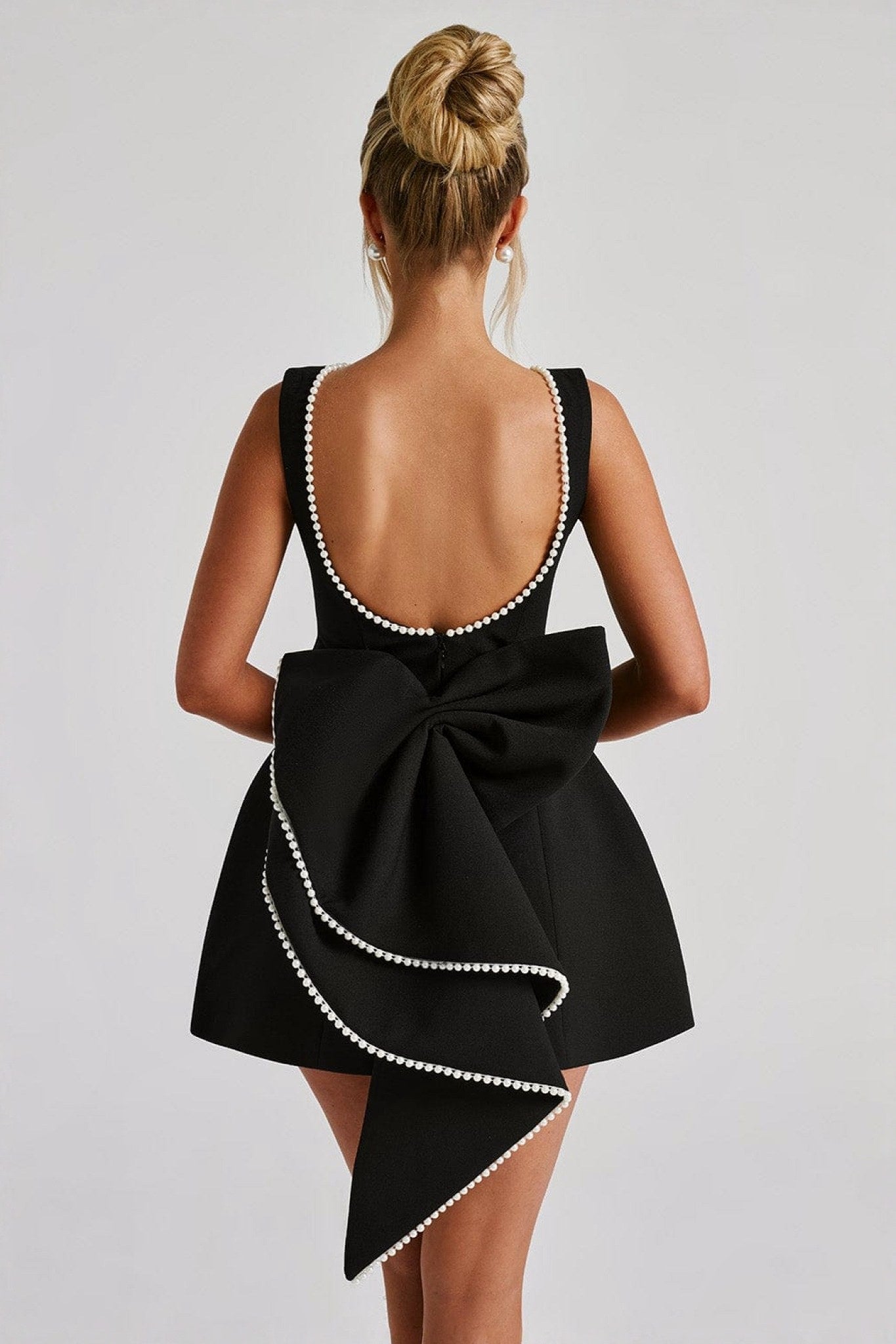 Ezabutus Elegant Pearl Trim Bow Back Mini Dress – Available in Pink, Black & White