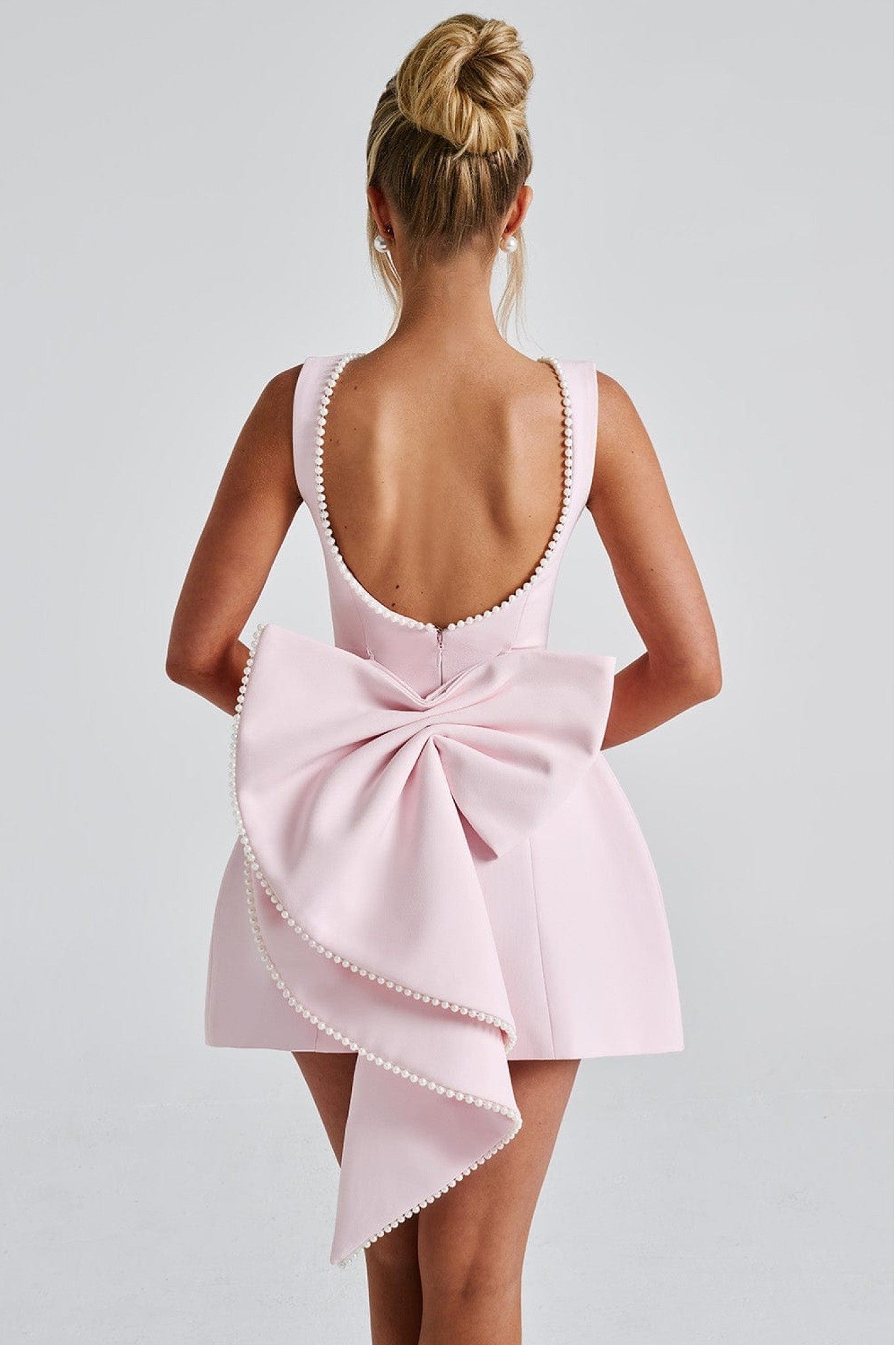 Ezabutus Elegant Pearl Trim Bow Back Mini Dress – Available in Pink, Black & White