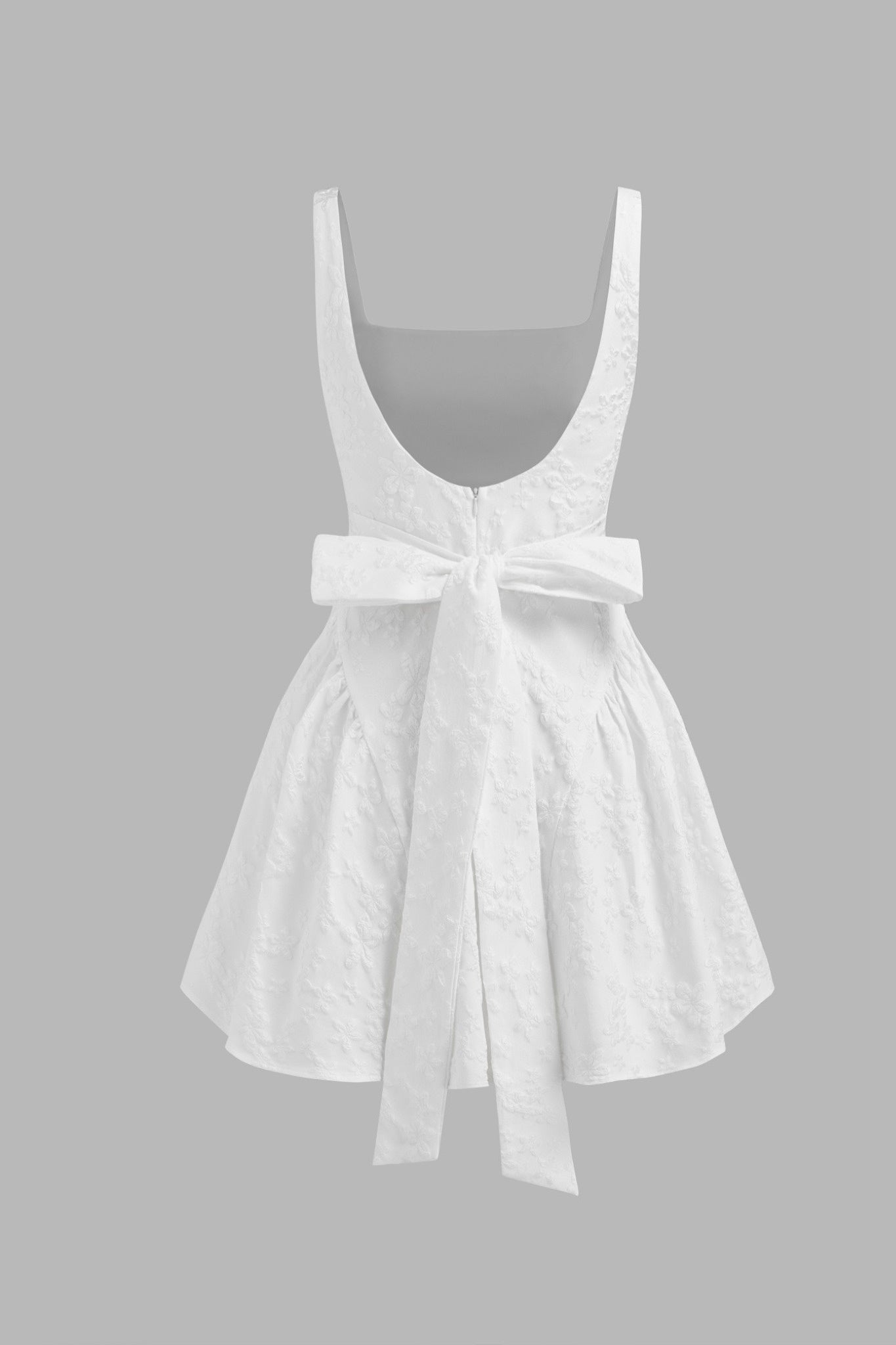 Ezabutus U Neckline White Floral Embossed Backless Bow Mini Dress