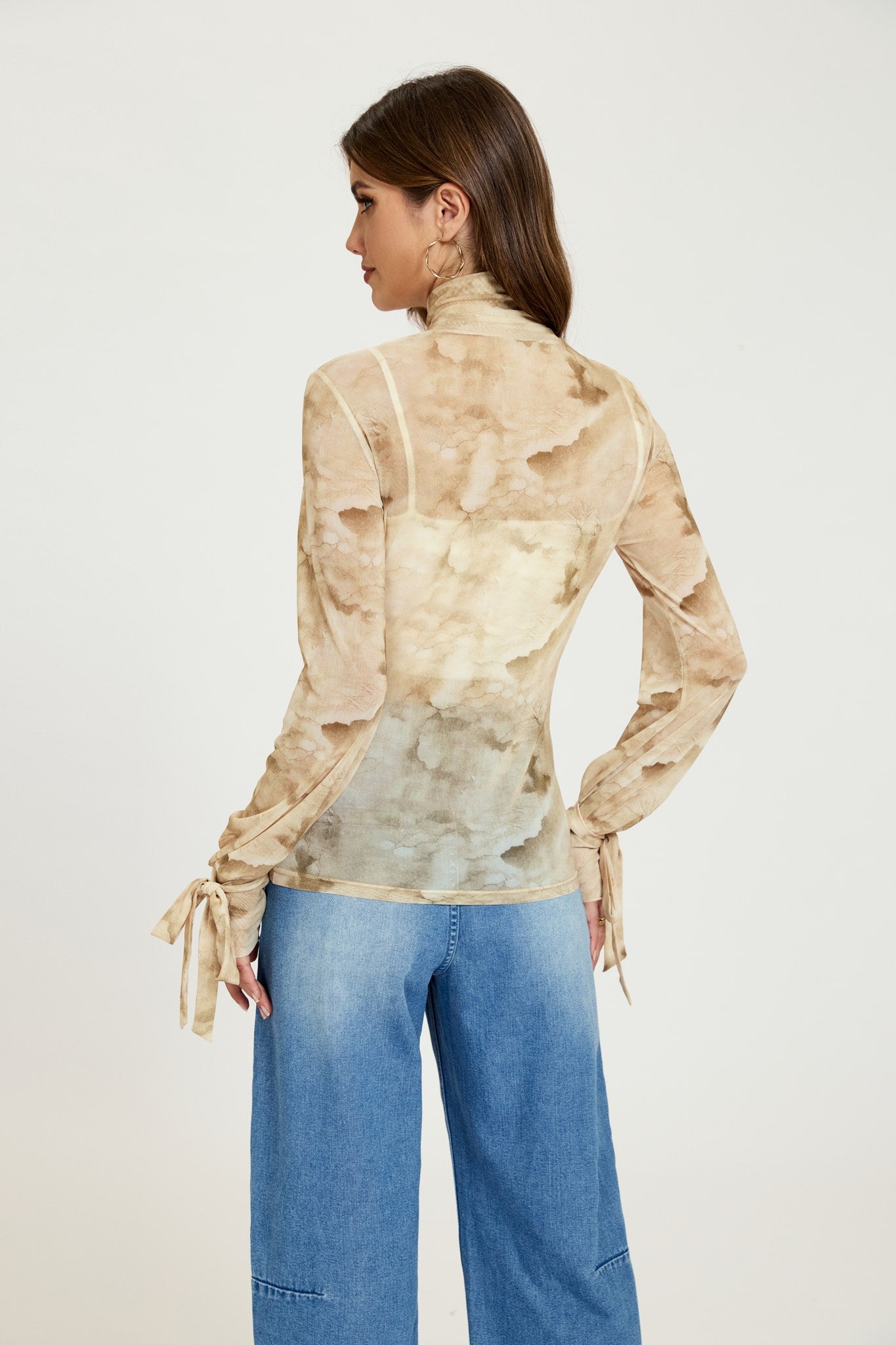 Ezabutus Tie Dye Turtleneck Blouse With Long Sleeves and Cuff Tie Detail