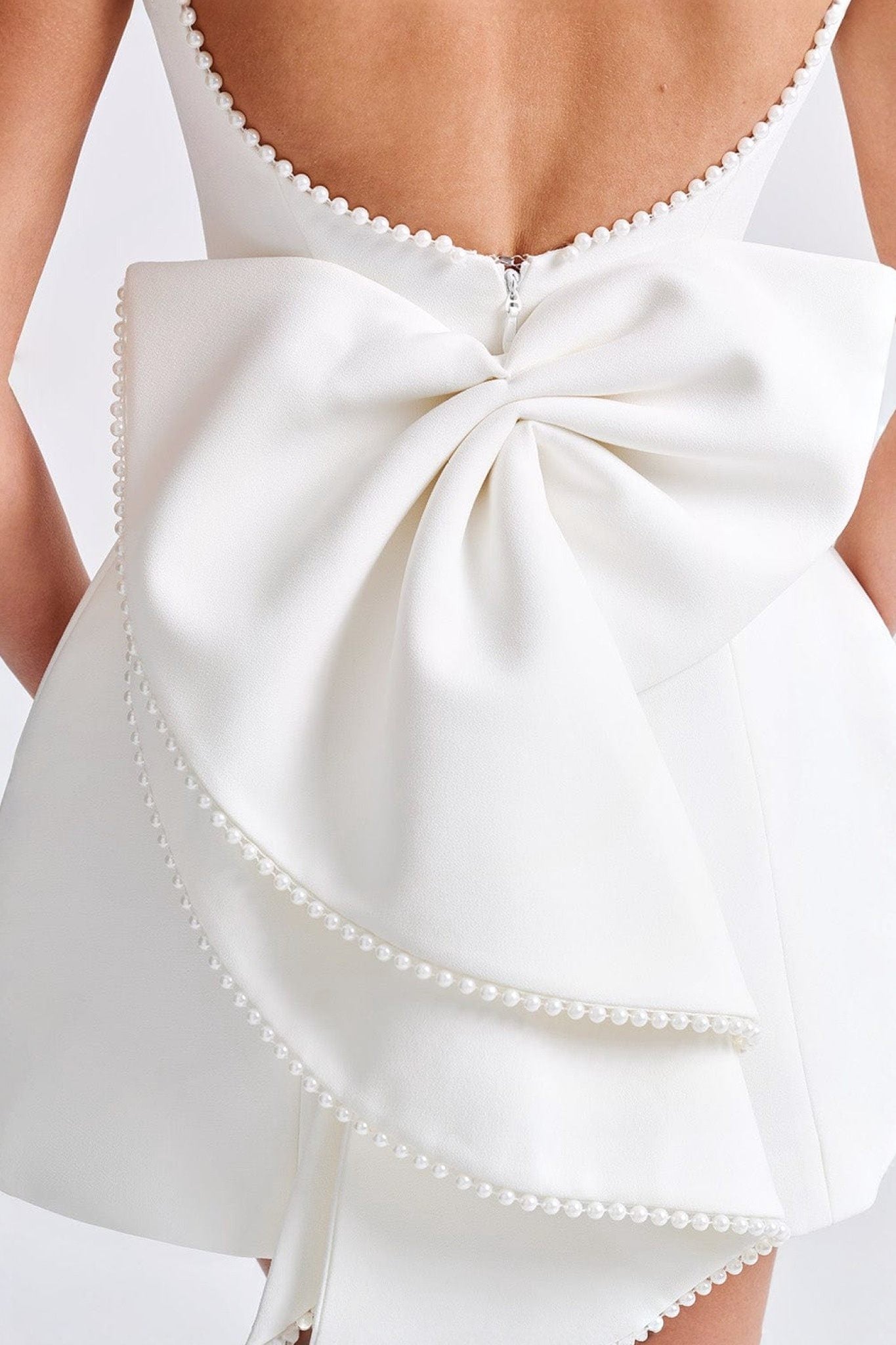 Ezabutus Elegant Pearl Trim Bow Back Mini Dress – Available in Pink, Black & White