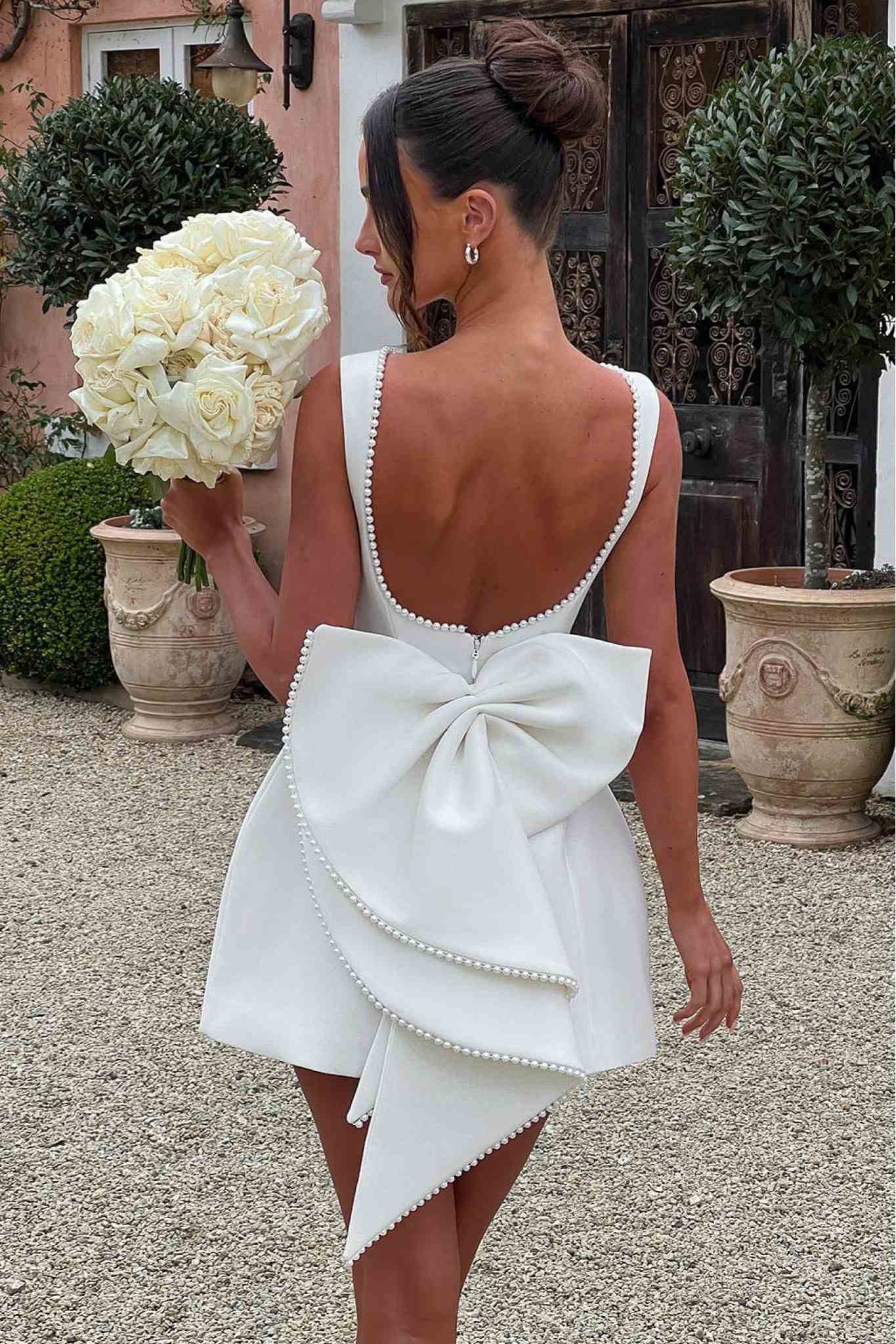 Ezabutus Elegant Pearl Trim Bow Back Mini Dress – Available in Pink, Black & White