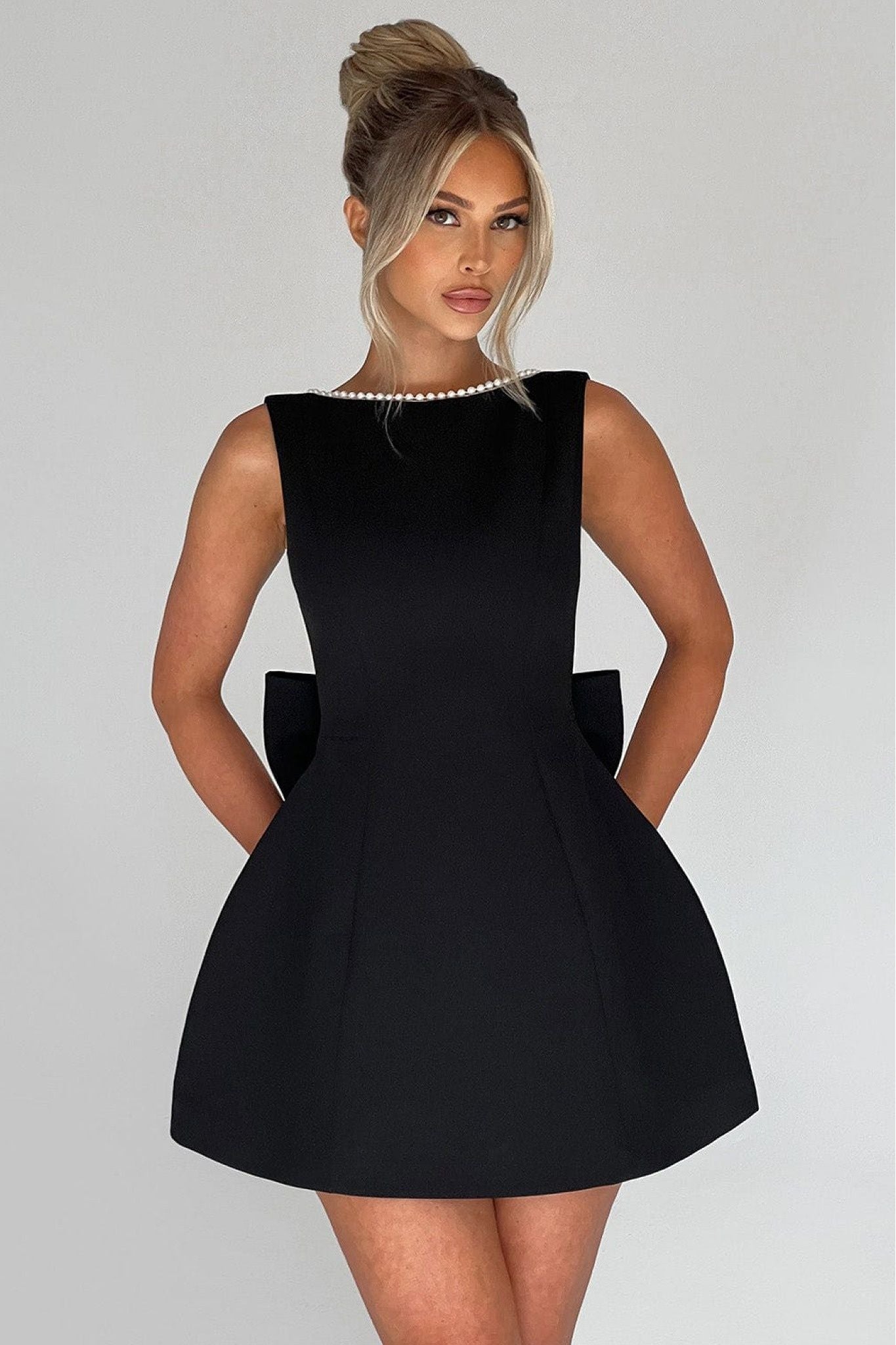 Ezabutus Elegant Pearl Trim Bow Back Mini Dress – Available in Pink, Black & White