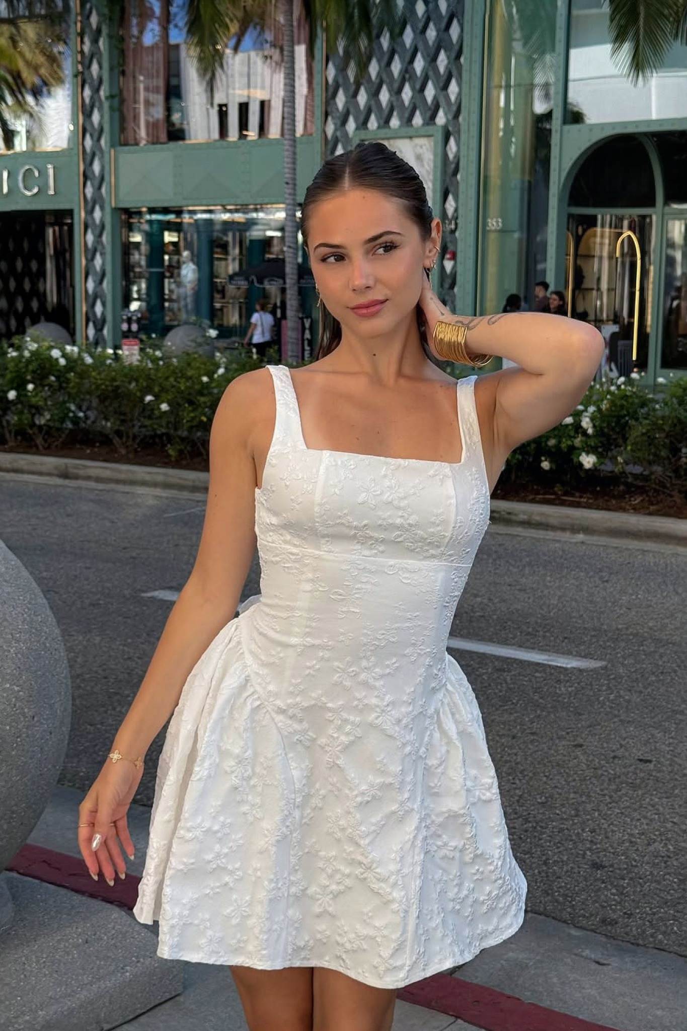 Ezabutus U Neckline White Floral Embossed Backless Bow Mini Dress