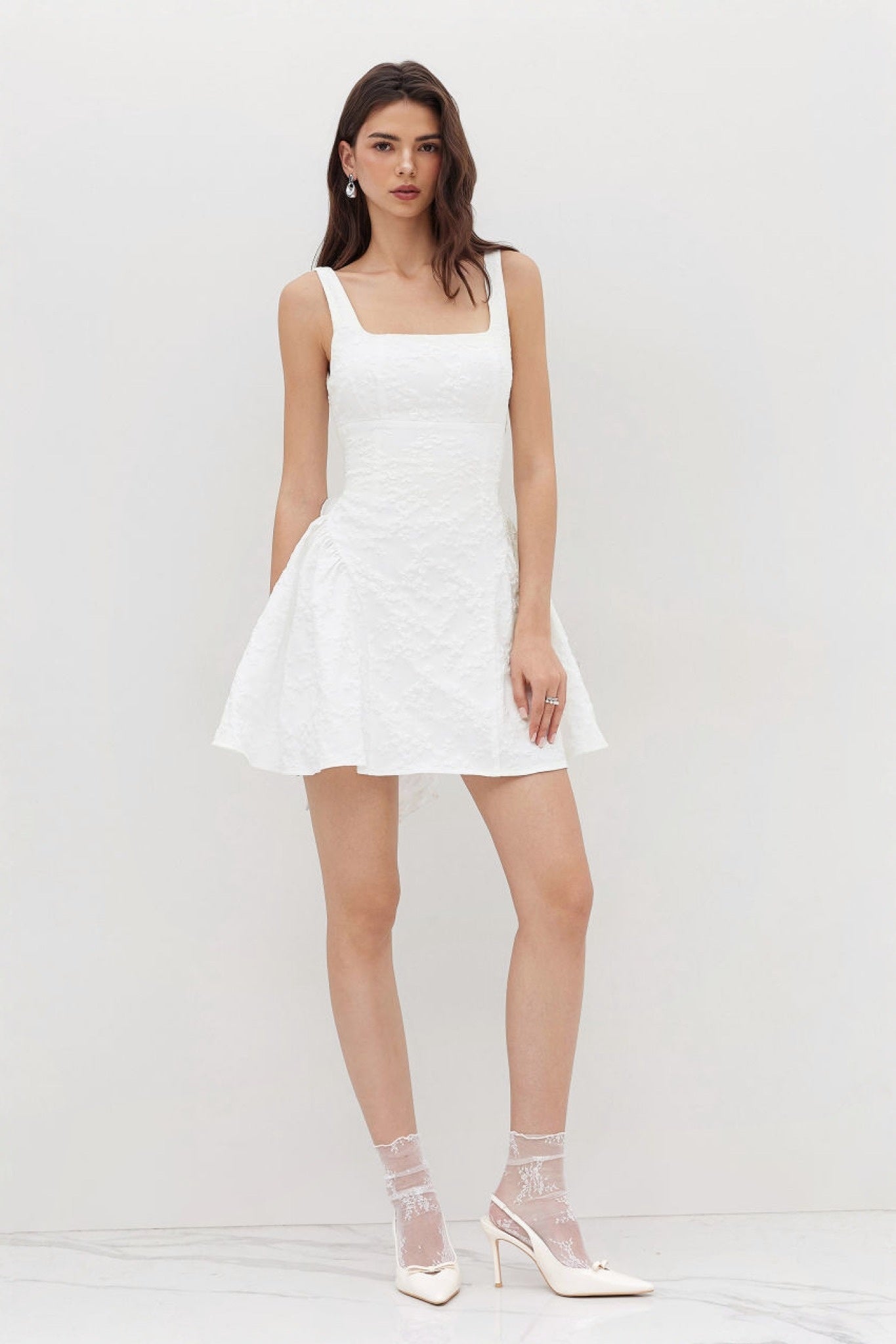 Ezabutus U Neckline White Floral Embossed Backless Bow Mini Dress