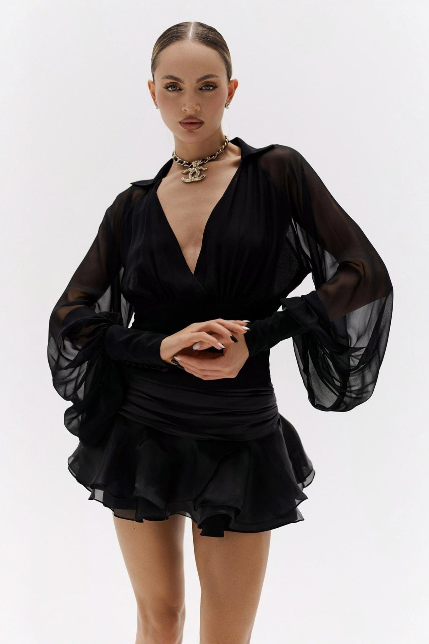 Ezabutus Elegant Sheer Sleeve Open Back Ruffled Hem Mini Dress